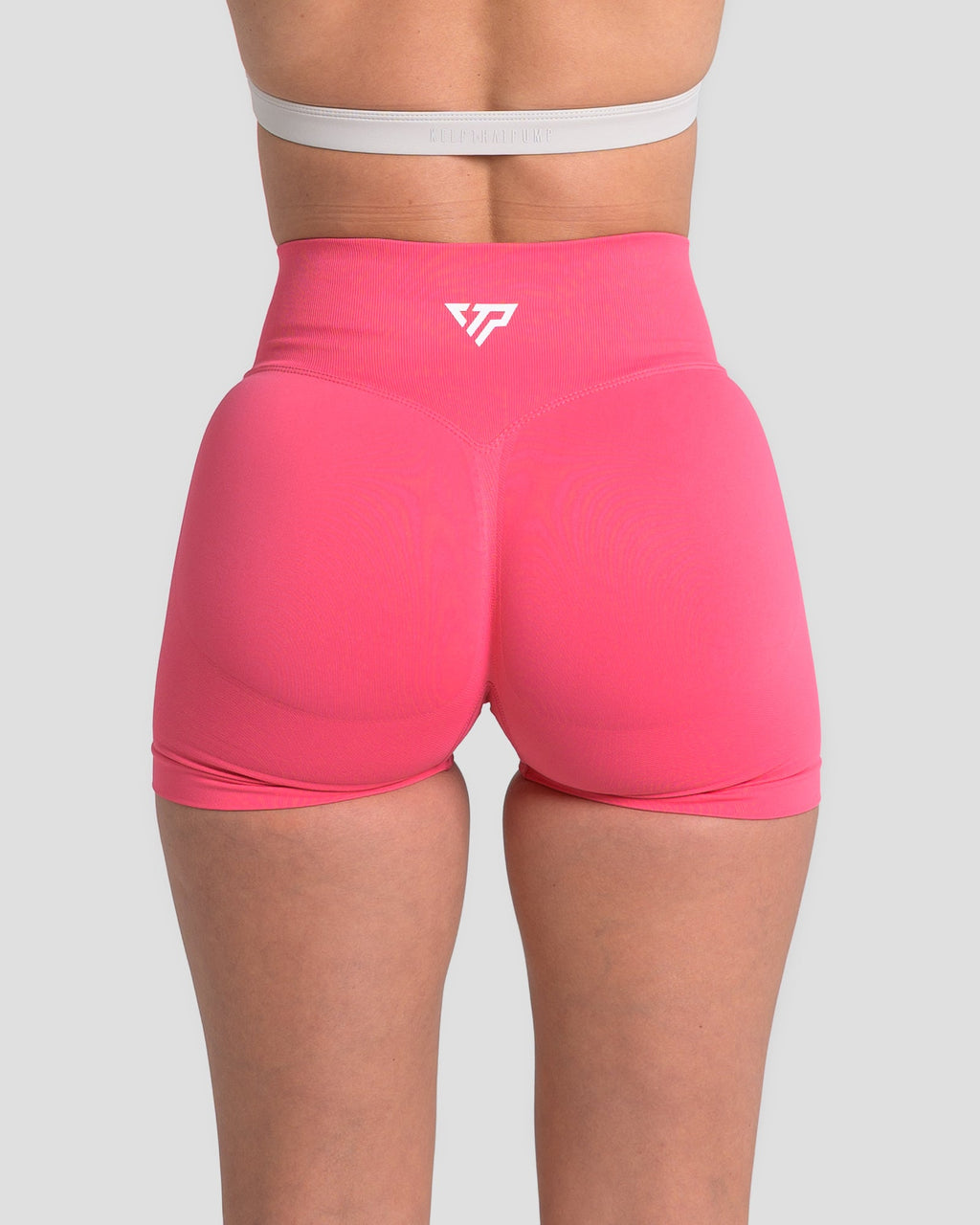 RECOIL HIGH WAIST SCRUNCH SHORTS - DARK CORAL