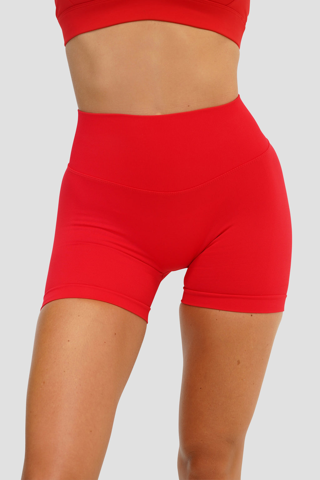 RECOIL HIGH WAIST SCRUNCH SHORTS - RED