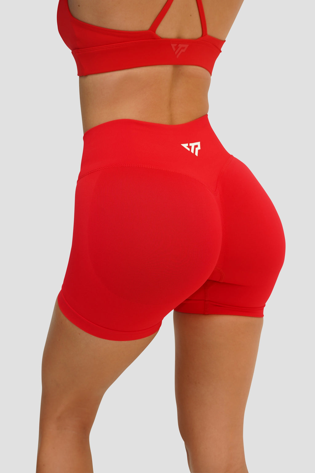 RECOIL HIGH WAIST SCRUNCH SHORTS - RED