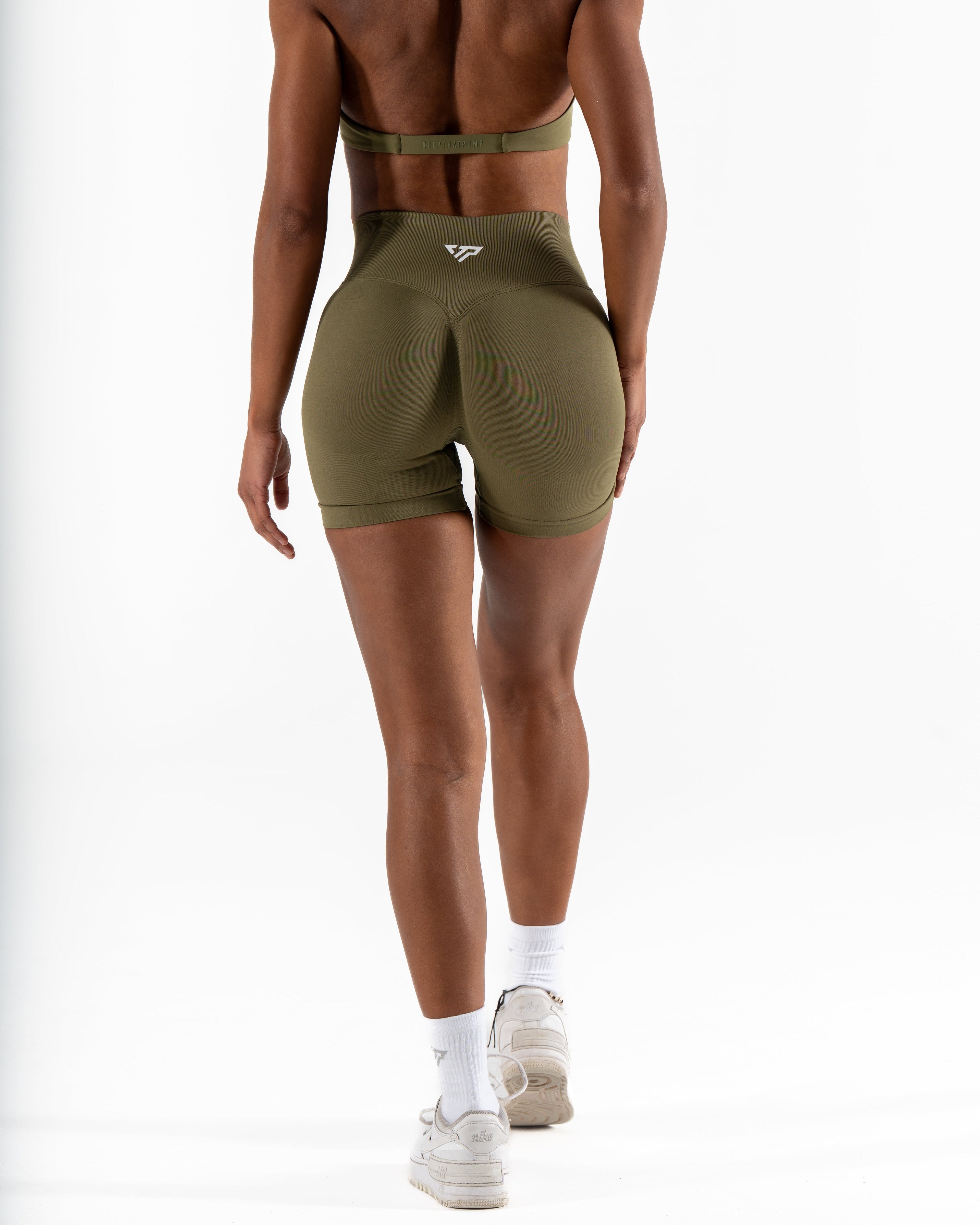 RECOIL HIGH WAIST SCRUNCH SHORTS - DARK KHAKI GREEN