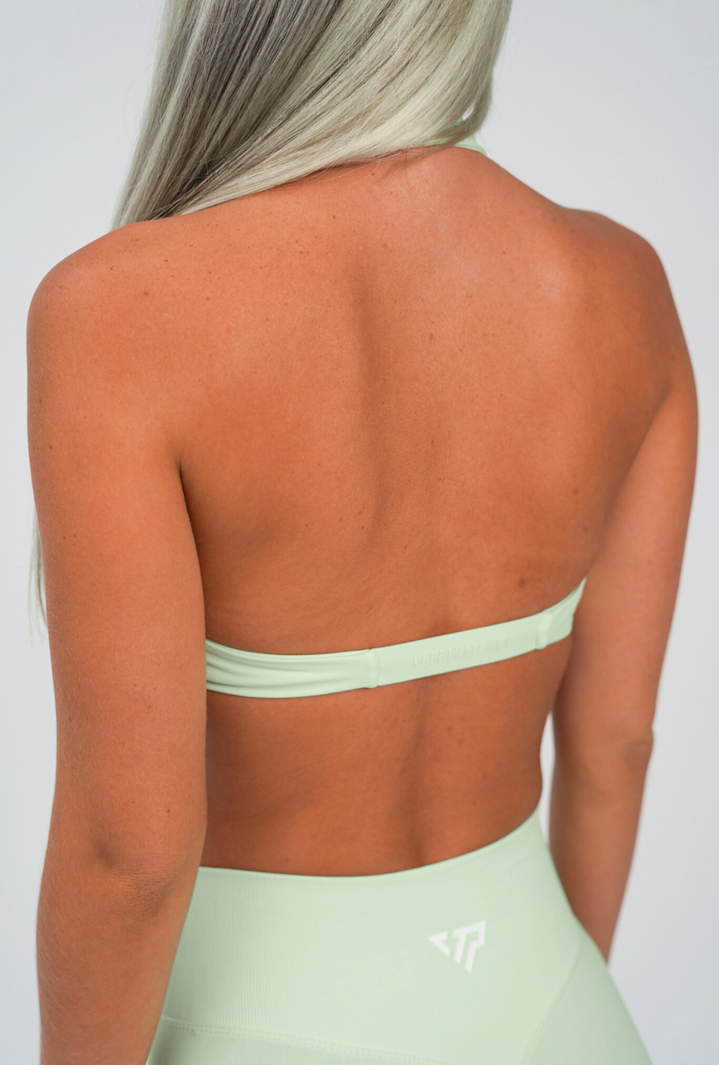 TWIST HALTER BRA - SAGE GREEN