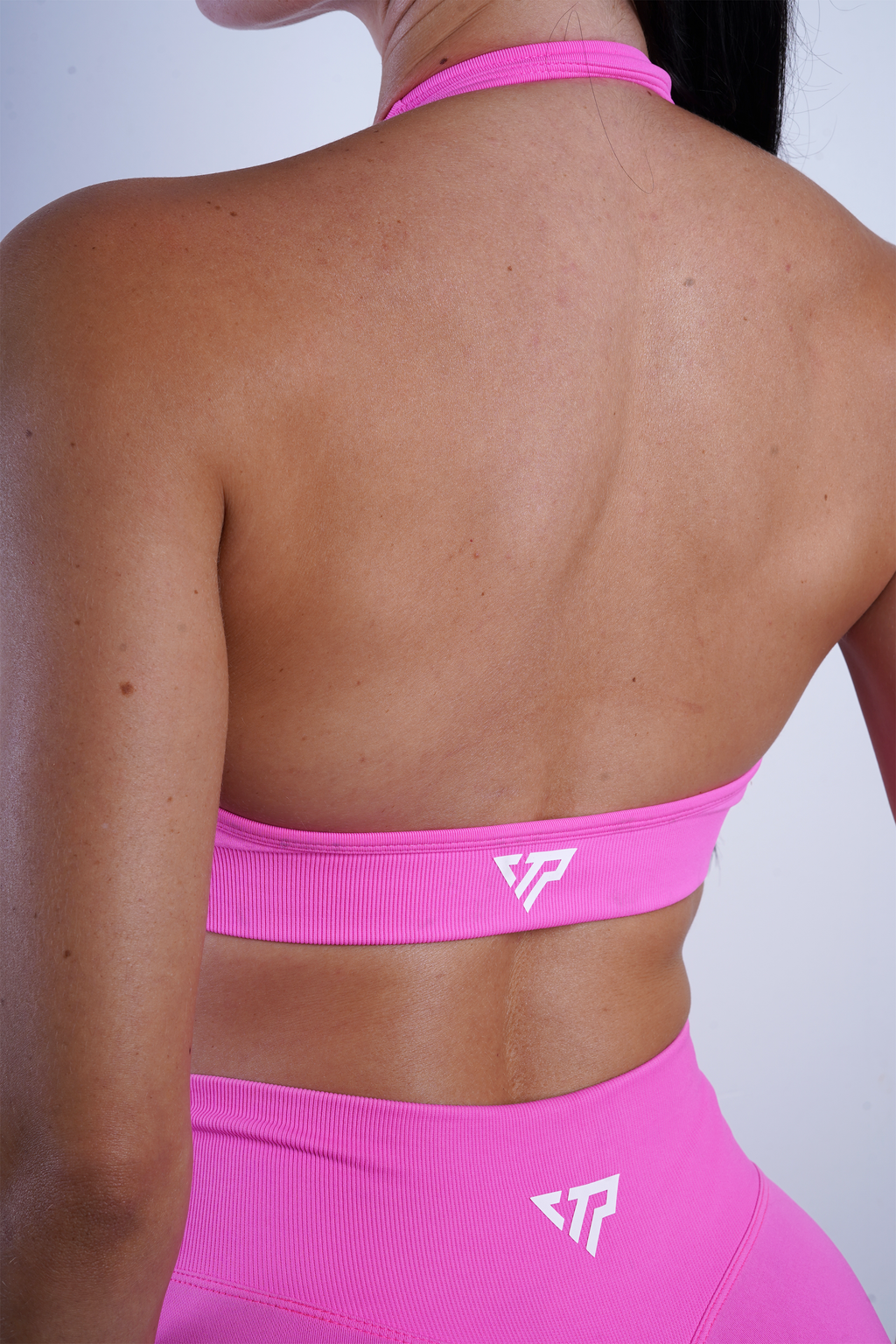 RECOIL HALTER CROP - NEON PINK